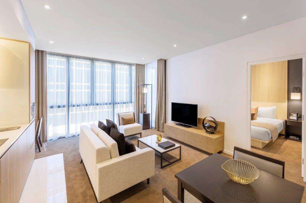 Skye Suites Σίδνεϊ Δωμάτιο φωτογραφία A living room at the hotel